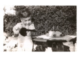 Little Boy with Toy Machine Gun and Cake Posters