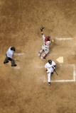 Cardinals v Milwaukee Brewers - G. Six, Milwaukee, WI - Oct. 16: Yadier Molina and Mark Kotsay Photographic Print by Christian Petersen