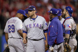 Texas Rangers v St Louis Cardinals, St Louis, MO - Oct. 27: Colby Lewis and Ron Washington Photographic Print by Ezra Shaw