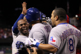 Rangers v Cardinals, St Louis, MO - Oct. 27: Nelson Cruz, Esteban German and Yorvit Torrealba Photographic Print by Ezra Shaw
