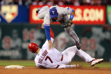 Texas Rangers v St Louis Cardinals, St Louis, MO - Oct. 27: Elvis Andrus and Matt Holliday Photographic Print by Jamie Squire