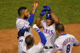 Rangers v Cardinals - Oct. 27: Adrian Beltre, Esteban German, Yorvit Torrealba and Elvis Andrus Photographic Print by Dilip Vishwanat