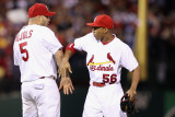 Brewers v St. Louis Cardinals - G. Three, St Louis, MO - Oct. 12: Albert Pujols and Adron Chambers Lámina fotográfica por Christian Petersen