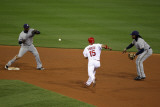 Brewers v St. Louis Cardinals - Oct. 12: Rickie Weeks, Yuniesky Betancourt and Rafael Furcal Photographic Print by Jamie Squire