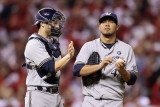 Brewers v St. Louis Cardinals - Oct. 12: Jonathan Lucroy and Yovani Gallardo Photographic Print by Christian Petersen