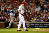 Detroit Tigers v Texas Rangers - G. Six, Arlington, TX - Oct. 15: Jhonny Peralta and Derek Holland Photographie par Kevork Djansezian