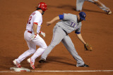 Rangers v Cardinals, St Louis, MO - Oct. 27: Lance Berkman, Colby Lewis and Michael Young Photographic Print by Doug Pensinger