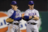 Game 7 - Rangers v Cardinals, St Louis, MO - October 28: Ian Kinsler and Michael Young Photographic Print by Ezra Shaw