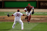 Game 7 - Rangers v Cardinals, St Louis, MO - October 28: Jason Motte and Yadier Molina Photographic Print by Rob Carr 