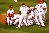 Game 7 - Rangers v Cardinals, St Louis, MO - October 28: Jason Motte and Yadier Molina Photographic Print by Dilip Vishwanat