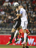 Vancouver, DA October 12 - Clyde Simms and Jay DeMerit Photographic Print by Jeff Vinnick