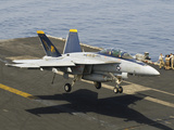 An F/A-18E Super Hornet Trap Landing on the Flight Deck of USS Harry S. Truman Photographic Print by  Stocktrek Images