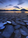 Ice Flakes Drifting Towards the Mountains on Tjeldoya Island, Norway Photographic Print by  Stocktrek Images
