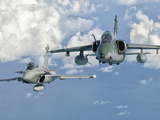A Dassault Rafale of the French Air Force Flys Alongside an Embraer A-1B of the Brazilian Air Force Photographic Print by  Stocktrek Images