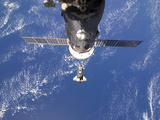 Space Shuttle Discovery Approaches the International Space Station Photographic Print by  Stocktrek Images