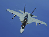 A U.S. Navy F/A-18F Super Hornet in Flight Near Joint Base Pearl Harbor-Hickam, Hawaii Photographic Print by  Stocktrek Images