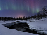 Aurora Borealis over Blafjellelva River in Troms County, Norway Photographic Print by  Stocktrek Images