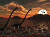 Omeisaurus Dinosaurs Roam Freely in a Freshwater Lake Photographic Print by  Stocktrek Images