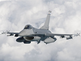 An F-16 from the Colorado Air National Guard in Flight over Brazil Photographic Print by  Stocktrek Images