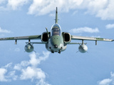 A Brazilian Air Force Embraer A-1B Soars Through the Sky over Brazil Photographic Print by  Stocktrek Images