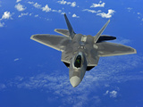 A U.S. Air Force F-22 Raptor in Flight Near Guam Photographie par  Stocktrek Images