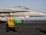 An F/A-18C Is Ready to Launch from the Flight Deck of USS Eisenhower Photographic Print by  Stocktrek Images