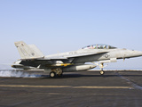 An F/A-18E Super Hornet Lands Aboard USS Harry S. Truman Photographic Print by  Stocktrek Images