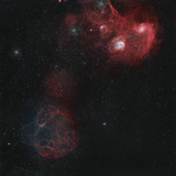 Widefield View of Of Simeis 147, the Flaming Star Nebula, and the Tadpole Nebula Photographic Print by  Stocktrek Images