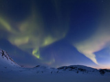 Aurora Borealis over Skittendalen Valley in Troms County, Norway Photographic Print by  Stocktrek Images