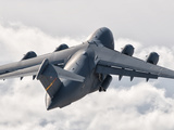 A C-17 Globemaster Flying Above the Clouds over Nellis Air Force Base, Nevada Photographic Print by  Stocktrek Images