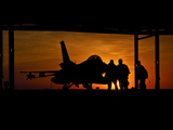 Silhouette of a Chilean Air Force F-16C Block 50 at Natal Air Force Base, Brazil Photographic Print by  Stocktrek Images