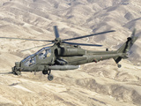 An Italian Army AW-129 Mangusta over Afghanistan Lámina fotográfica por Stocktrek Images