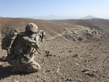 U.S. Army Soldier Provides Security for Infantry Patrolling Through Dandarh Village, Afghanistan Photographic Print by  Stocktrek Images
