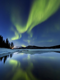 Aurora Borealis over Sandvannet Lake in Troms County, Norway Fotoprint van Stocktrek Images