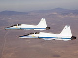 Two T-38A Mission Support Aircraft Fly in Tight Formation Photographic Print by  Stocktrek Images