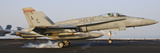 An F/A-18 Hornet Lands Aboard USS Harry S. Truman Photographic Print by  Stocktrek Images