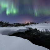 Aurora Borealis over Blafjellelva River in Troms County Photographic Print by  Stocktrek Images