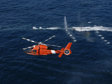 A Helicopter Crew Trains Off the Coast of Jacksonville, Florida Lámina fotográfica por Stocktrek Images