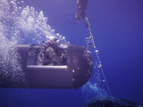 A Seal Delivery Vehicle on Tether with a Buoy Recovery Line Photographic Print by  Stocktrek Images
