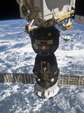 The Soyuz TMA-19 Spacecraft Docked to the Rassvet Mini-Research Module 1 Photographic Print by  Stocktrek Images
