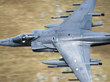 A Royal Air Force Harrier GR9 Flying Low over North Wales Photographic Print by  Stocktrek Images