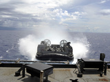A Landing Craft Air Cushion Prepares to Enter the Well-Deck of USS Harpers Ferry Photographic Print by  Stocktrek Images