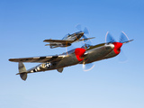 A P-38 Lightning and P-51D Mustang in Flight Photographic Print by  Stocktrek Images
