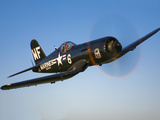 A Vought F4U-5 Corsair in Flight Photographic Print by  Stocktrek Images