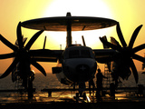 Sailors Work on an E-2C Hawkeye Aircraft Aboard USS Abraham Lincoln Photographic Print by  Stocktrek Images