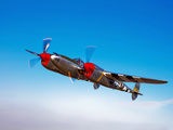A Lockheed P-38 Lightning Fighter Aircraft in Flight Photographic Print by  Stocktrek Images