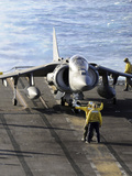 Sailors Prepare to Launch an AV-8B Harrier During Flight Operations Aboard USS Peleliu Photographic Print by  Stocktrek Images