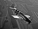 A P-51C Mustang in Flight Photographic Print by  Stocktrek Images