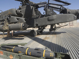 An AGM-114 Hellfire Missile Is Ready to Be Loaded onto an AH-64 Apache Photographic Print by  Stocktrek Images