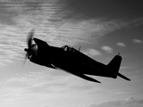 A Grumman F6F Hellcat Fighter Plane in Flight Photographic Print by  Stocktrek Images